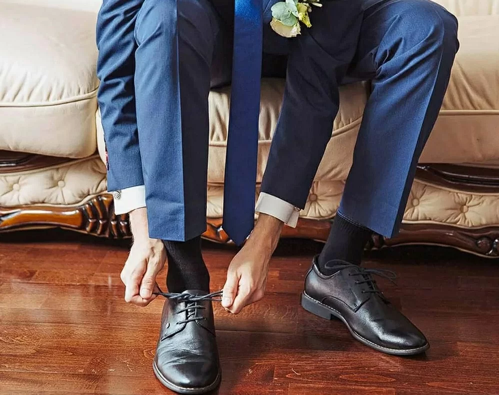 Черные носки эффектно смотрятся в сочетании с классическим костюмом